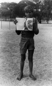 Ross Jones with his pastel drawing book. Photographer: Vera Hack, January 1950. Noel & Lily White Collection.