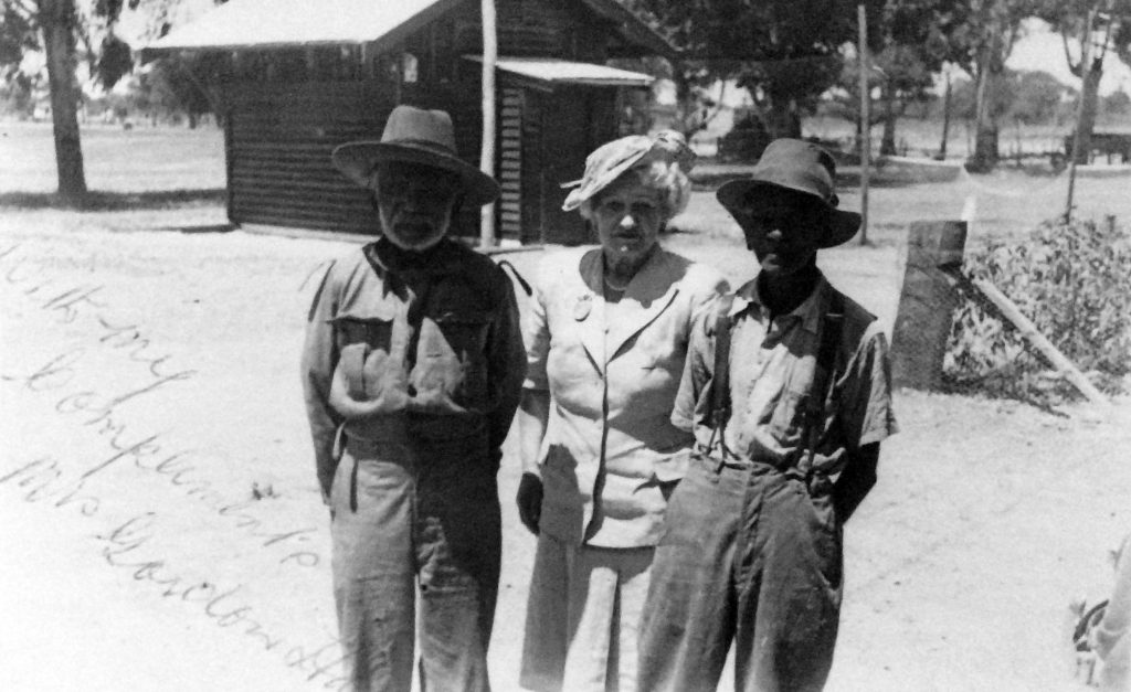 Mrs Rutter with two of the trackers at Carrolup during her second visit. Photographer: Vera Hack, January 1950. Noel & Lily White Collection.