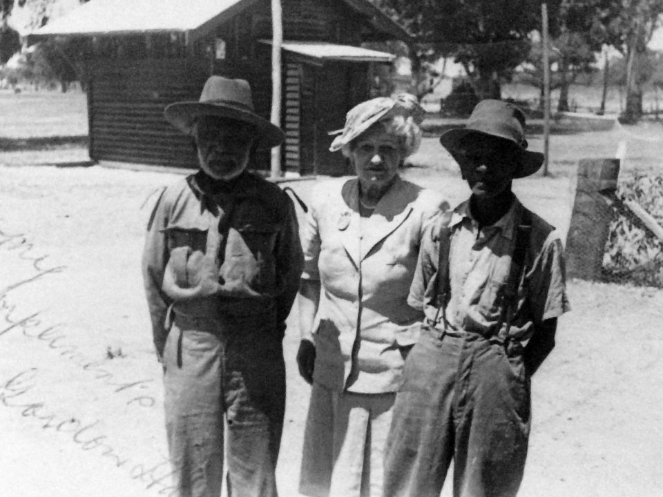 Mrs Rutter with two of the trackers at Carrolup during her second visit. Photographer: Vera Hack, January 1950. Noel & Lily White Collection.