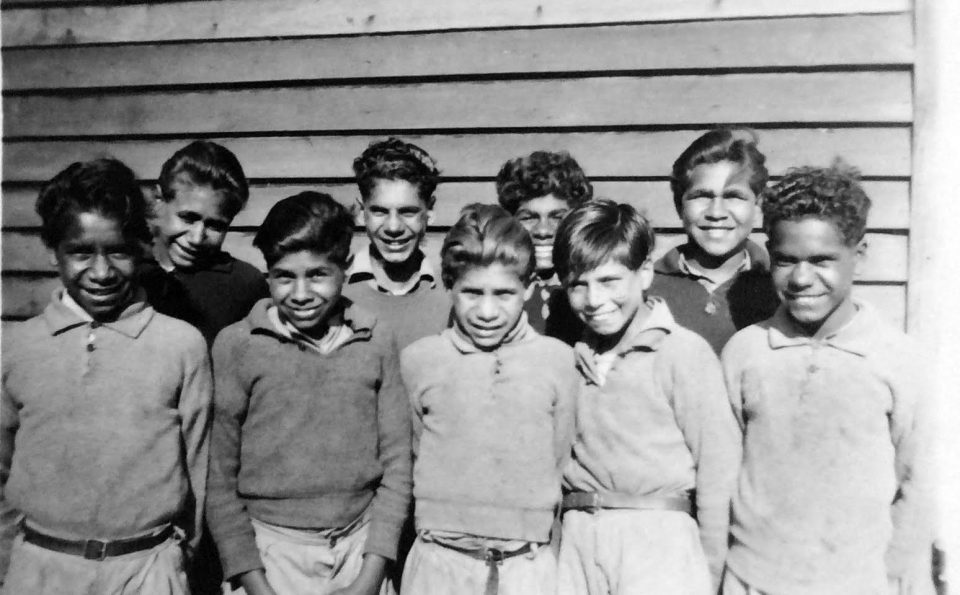 Some of the Carrolup young artists. Front row: Reynold Hart (Far Left), Parnell Dempster (Middle) and Revel Cooper (Far Right). Back row, 2nd Left: Barry Loo. Do you know who the other boys are?