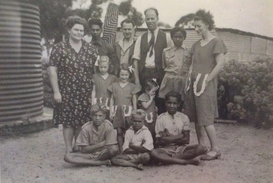 Mr and Mrs White with some of the Carrolup boys and the Peet family. Back row: Barry Loo, Mr. Peet, Noel White, Adrian Allen and Mrs. Peet. Middle row: Lily White and the three Peet girls. Front row: Parnell Dempster, unidentified boy and Reynold Hart. Photograph taken in 1949. Noel & Lily White Collection.
